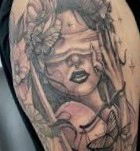 Latitante da 19 anni, lo tradisce un tatuaggio Latitante da 19 anni, lo tradisce un tatuaggio